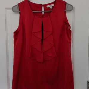 Red ruffle front sleeveless shirt